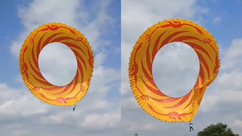 武汉风筝比赛 男子被“滚地龙”卷上天（视频）