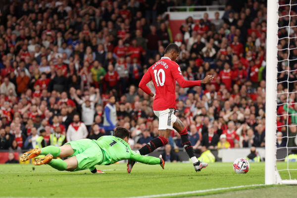 MANCHESTER, ENGLAND - MAY 25: Marcus Rashford of Manchester United scores the team's fourth goal past Kepa Arrizabalaga of Chelsea during the Premier League match between Manchester United and Chelsea FC at Old Trafford on May 25, 2023 in Manchester, England. 