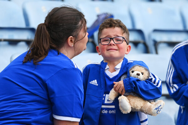 LEICESTER, ENGLAND - MAY 28: A Leicester City fan looks dejected after their sides defeat, resulting in their relegation to the Championship during the Premier League match between Leicester City and West Ham United at The King Power Stadium on May 28, 2023 in Leicester, England. 