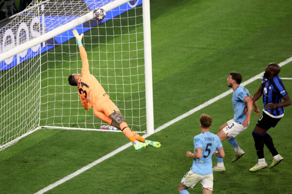ISTANBUL, TURKEY - JUNE 10: Federico Dimarco of FC Internazionale (not pictured) hits the crossbar with a header as Ederson of Manchester City dives during the UEFA Champions League 2022/23 final match between FC Internazionale and Manchester City FC at Atatuerk Olympic Stadium on June 10, 2023 in Istanbul, Turkey. 