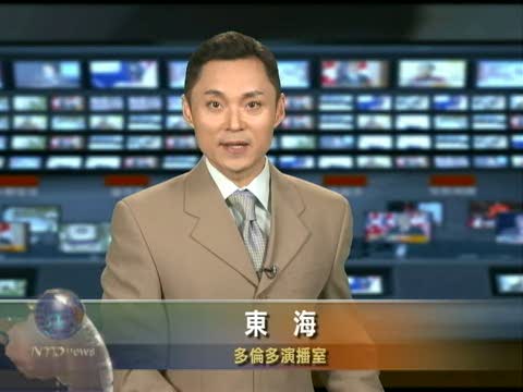 薩科齊對哈珀反對銀行稅說不