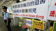 人权监察关注港法轮功真相点遭压