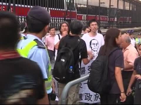 胡錦濤抵港 李旺陽伸冤團如影隨形