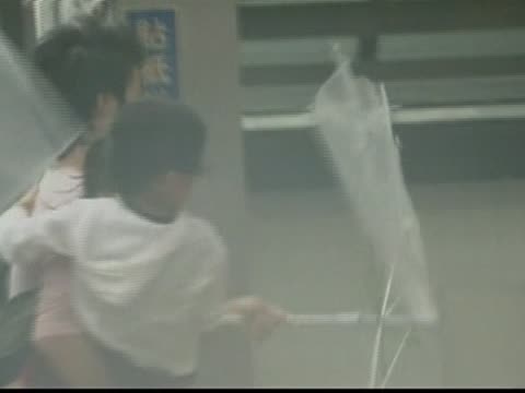 強颱風襲日 造成傷亡和交通中斷