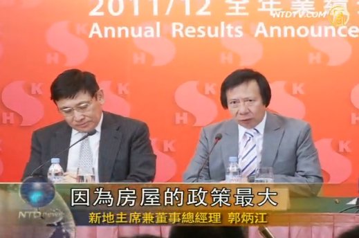 不滿梁振英壓樓市 港地產巨富反擊