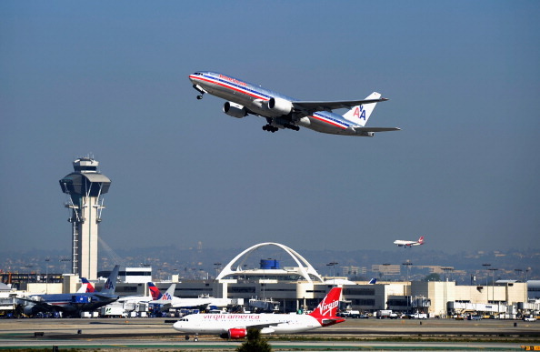達成和解 美國與全美航空終將合併
