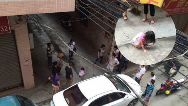 廣州2歲女童從5樓墮地 砸凹車頂奇蹟無事