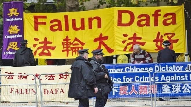 習近平訪英  法輪功籲法辦江澤民