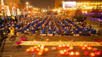 和平上访18年 法轮功学员纽约烛光夜悼