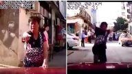 浙江大妈隔空碰瓷  连续躺倒后起身追撞私家车