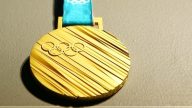 史上“重量级”奖牌 平昌冬奥会金牌为99.99％纯银打造
