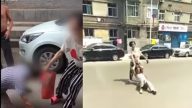 山西女当街打母扯发拖行 引发众怒遭群殴（视频）