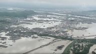日本罕见暴雨肆虐 致76死千人被困