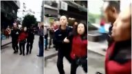 重庆女持刀砍杀14幼童  被抓获时遭围殴（视频）