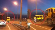 奇葩男假扮“小巴”闯上桥 遭警卫围堵转向逃跑