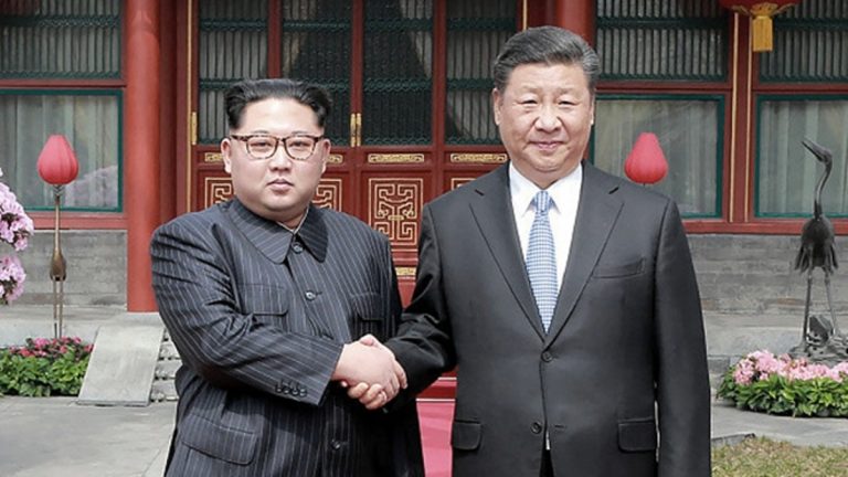 習近平與金正恩互致賀電 專家：利益婚姻