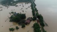 中國南方接連暴雨 水庫洩洪加重洪災