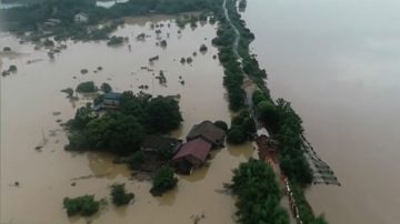 中國南方接連暴雨 水庫洩洪加重洪災