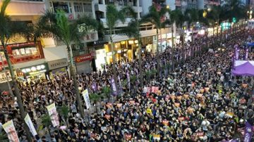 典良：当港人都拿起《九评》游行时……