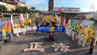 迫害持续20年 纽约法轮功学员中领馆前烛光悼念
