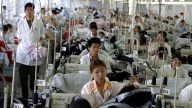 名牌撤离 中国25%运动服加工厂歇业