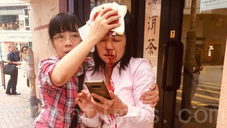 香港法輪功學員遇襲 華府中使館前抗議