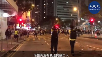 诡异！2蒙面男打爆玻璃 向港警喊“自己人”