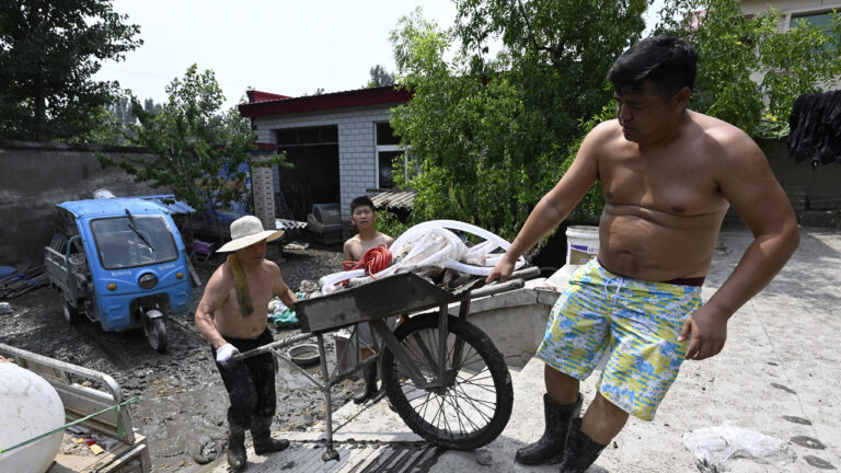 中國多地洪水肆虐 民眾想逃往美國