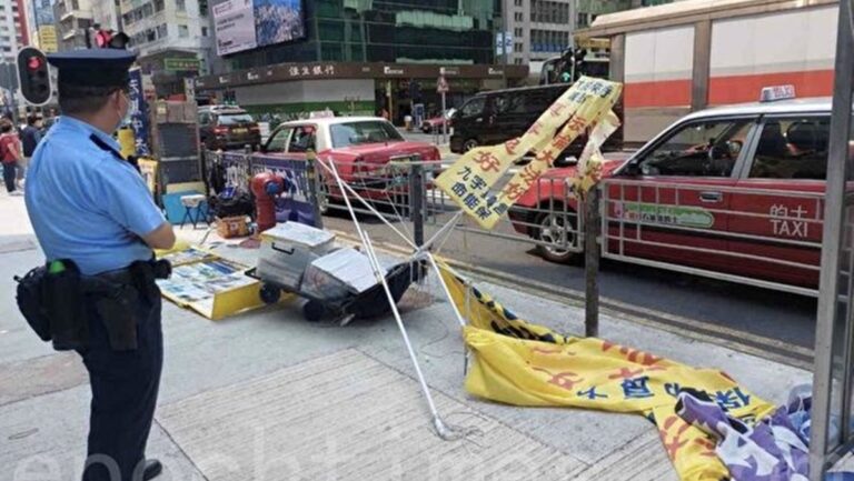 香港法輪功真相點遭襲擊 市民大聲遏止歹徒
