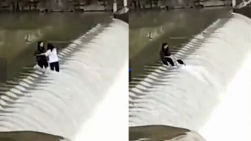 湘西2女孩站水坝拍照 冲入急流画面惊险(视频)