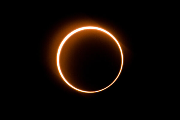 https://www.gettyimages.com/detail/news-photo/the-moon-moves-in-front-of-the-sun-in-a-rare-ring-of-fire-news-photo/1190487469