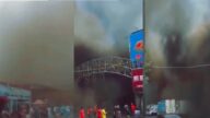 大連一市場附近起火 地鐵站停運(視頻)