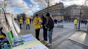国际人权日：巴黎法轮功学员讲真相