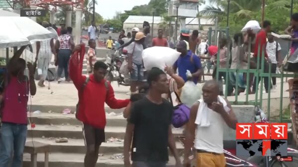 敌对帮派爆枪战 海地首都民众惊慌逃离家园