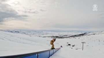 新世界纪录 自由式滑雪者在铁轨上飞驰