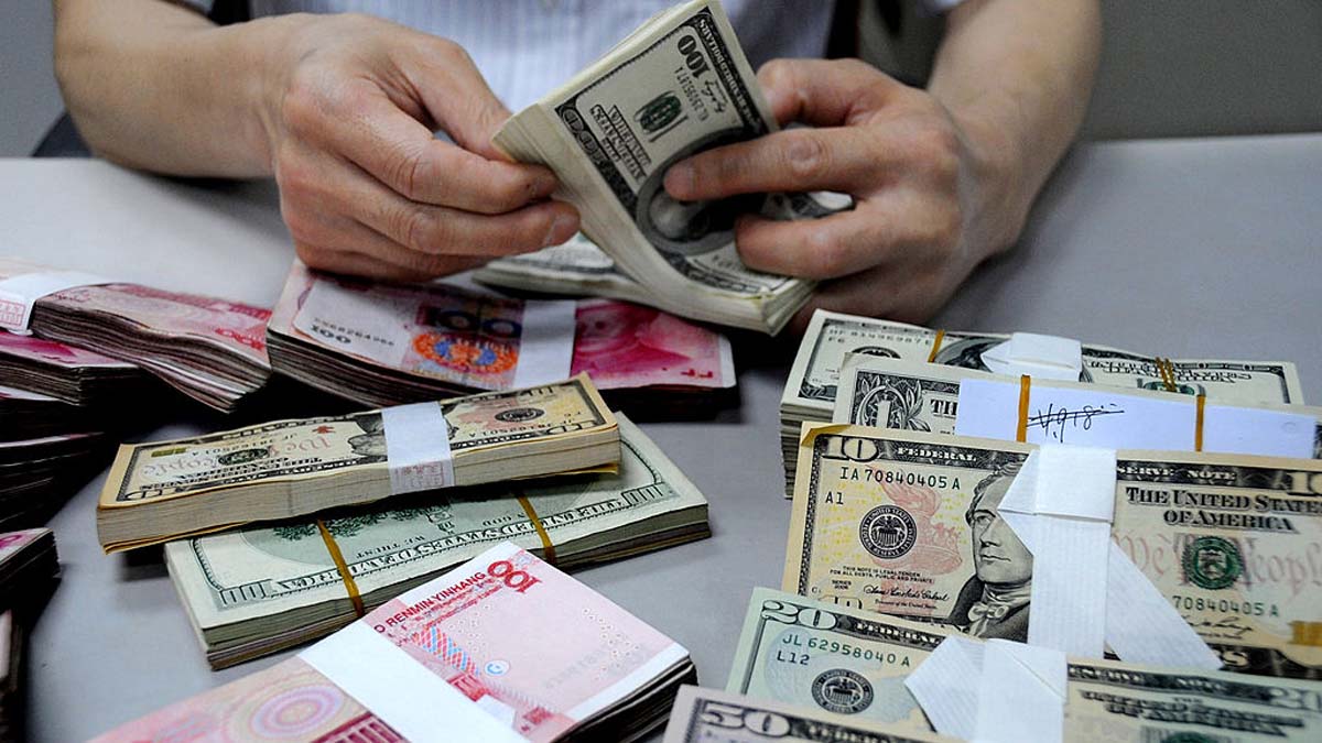 路透：北京下令银行抛售美元以阻人民币续贬| 人民币汇率| 人民币贬值  image