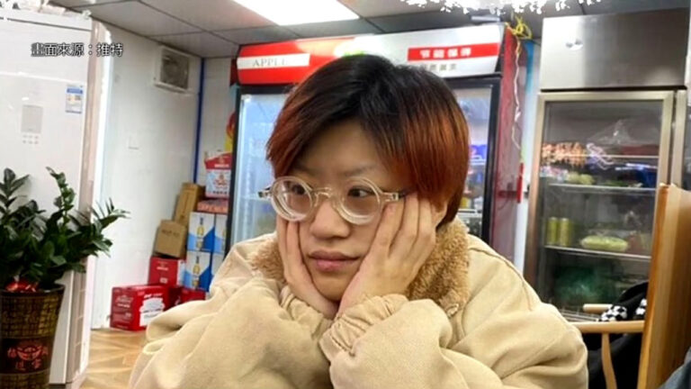 廣州女青年楊紫荊圍觀白紙運動遭刑拘