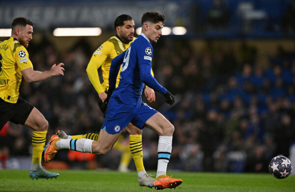 Chelsea's German midfielder Kai Havertz (R) runs with the ball during the UEFA Champions League round of 16 second-leg football match between Chelsea and Borrusia Dortmund at Stamford Bridge in London on March 7, 2023. (Photo by Glyn KIRK / IKIMAGES / AFP) (Photo by GLYN KIRK/IKIMAGES/AFP via Getty Images)