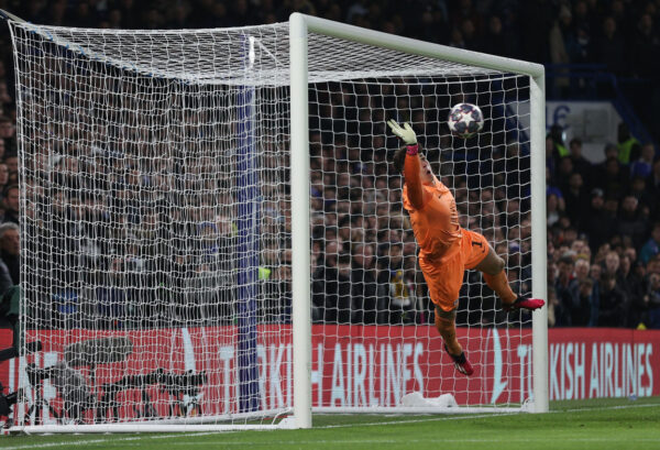 Chelsea's Spanish goalkeeper Kepa Arrizabalaga dices to save a free-kick during the UEFA Champions League round of 16 second-leg football match between Chelsea and Borrusia Dortmund at Stamford Bridge in London on March 7, 2023. (Photo by ADRIAN DENNIS / AFP) (Photo by ADRIAN DENNIS/AFP via Getty Images)