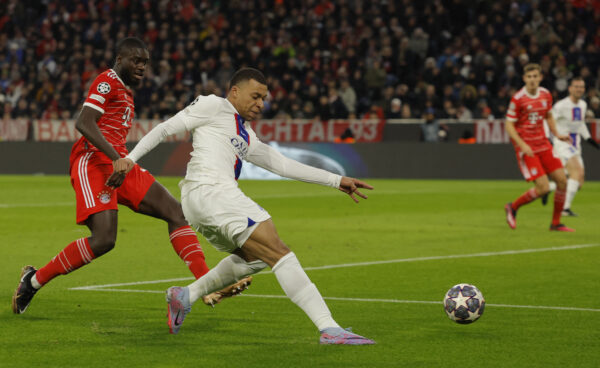 Bayern Munich's French defender Dayot Upamecano (L) and Paris Saint-Germain's French forward Kylian Mbappe vie for the ball during the UEFA Champions League round of 16, 2nd-leg football match FC Bayern Munich v Paris Saint-Germain FC in Munich, southern Germany, on March 8, 2023. (Photo by Odd ANDERSEN / AFP) (Photo by ODD ANDERSEN/AFP via Getty Images)
