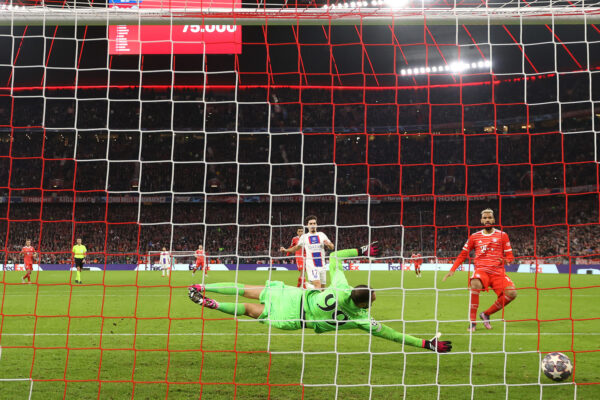 MUNICH, GERMANY - MARCH 08: Eric Maxim Choupo-Moting of FC Bayern Munich scores the team's first goal past Gianluigi Donnarumma of Paris Saint-Germain during the UEFA Champions League round of 16 leg two match between FC Bayern M眉nchen and Paris Saint-Germain at Allianz Arena on March 08, 2023 in Munich, Germany. (Photo by Alexander Hassenstein/Getty Images)