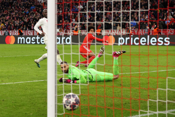MUNICH, GERMANY - MARCH 08: Serge Gnabry of FC Bayern Munich scores the team's second goal past Gianluigi Donnarumma of Paris Saint-Germain during the UEFA Champions League round of 16 leg two match between FC Bayern M眉nchen and Paris Saint-Germain at Allianz Arena on March 08, 2023 in Munich, Germany. (Photo by Alexander Hassenstein/Getty Images)