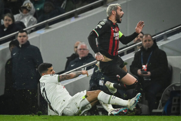 Tottenham Hotspur's Argentinian defender Cristian Romero (L) tackles AC Milan's French defender Theo Hernandez during the UEFA Champions League round of 16 second-leg football match between Tottenham Hotspur and Milan AC at Tottenham Hotspur Stadium in London on March 8, 2023. (Photo by JUSTIN TALLIS / AFP) (Photo by JUSTIN TALLIS/AFP via Getty Images)