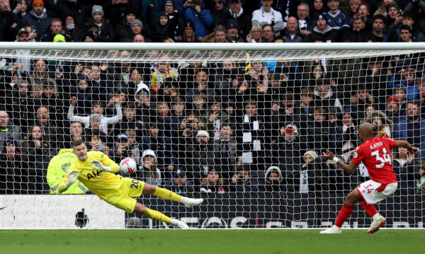 LONDON, ENGLAND - MARCH 11: Fraser Forster of Tottenham Hotspur saves a penalty from Andre Ayew of Nottingham Forest during the Premier League match between Tottenham Hotspur and Nottingham Forest at Tottenham Hotspur Stadium on March 11, 2023 in London, England. (Photo by Catherine Ivill/Getty Images)
