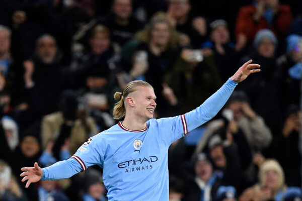 Manchester City's Norwegian striker Erling Haaland celebrates scoring the team's fifth goal, his fourth, during the UEFA Champions League round of 16 second-leg football match between Manchester City and RB Leipzig at the Etihad Stadium in Manchester, north west England, on March 14, 2023. (Photo by Oli SCARFF / AFP) (Photo by OLI SCARFF/AFP via Getty Images)