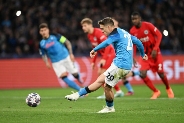 NAPLES, ITALY - MARCH 15: Piotr Zielinski of SSC Napoli scores the team's third goal during the UEFA Champions League round of 16 leg two match between SSC Napoli and Eintracht Frankfurt at Stadio Diego Armando Maradona on March 15, 2023 in Naples, Italy. (Photo by Francesco Pecoraro/Getty Images)