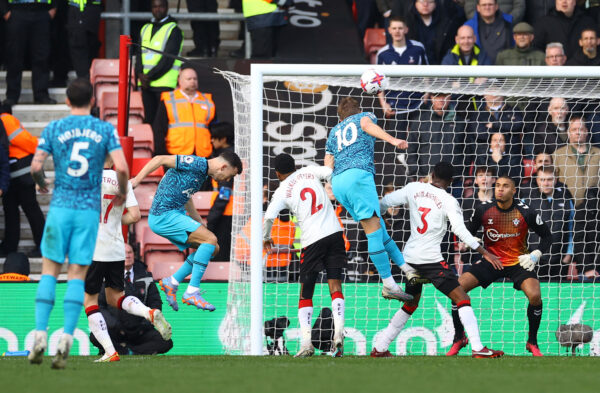 SOUTHAMPTON, ENGLAND - MARCH 18: Harry Kane of Tottenham Hotspur scores the team's second goal past Gavin Bazunu of Southampton during the Premier League match between Southampton FC and Tottenham Hotspur at Friends Provident St. Mary's Stadium on March 18, 2023 in Southampton, England. (Photo by Michael Steele/Getty Images)