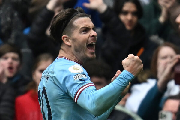 Manchester City's English midfielder Jack Grealish celebrates after scoring their fourth goal during the English Premier League football match between Manchester City and Liverpool at the Etihad Stadium in Manchester, north west England, on April 1, 2023. (Photo by Paul ELLIS / AFP) / RESTRICTED TO EDITORIAL USE. No use with unauthorized audio, video, data, fixture lists, club/league logos or 'live' services. Online in-match use limited to 120 images. An additional 40 images may be used in extra time. No video emulation. Social media in-match use limited to 120 images. An additional 40 images may be used in extra time. No use in betting publications, games or single club/league/player publications. / (Photo by PAUL ELLIS/AFP via Getty Images)
