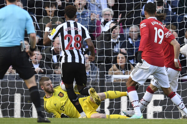 Manchester United's Spanish goalkeeper David de Gea makes a save during the English Premier League football match between Newcastle United and Manchester United at St James' Park in Newcastle-upon-Tyne, north east England on April 2, 2023. (Photo by Oli SCARFF / AFP) / RESTRICTED TO EDITORIAL USE. No use with unauthorized audio, video, data, fixture lists, club/league logos or 'live' services. Online in-match use limited to 120 images. An additional 40 images may be used in extra time. No video emulation. Social media in-match use limited to 120 images. An additional 40 images may be used in extra time. No use in betting publications, games or single club/league/player publications. / (Photo by OLI SCARFF/AFP via Getty Images)