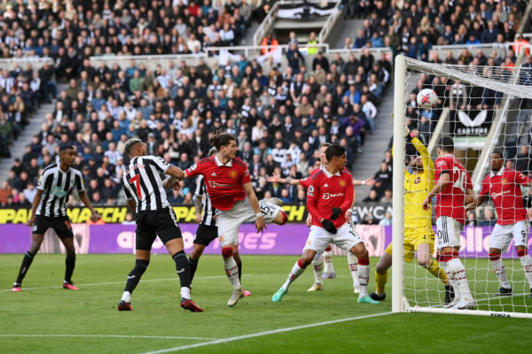 NEWCASTLE UPON TYNE, ENGLAND - APRIL 02: Joelinton of Newcastle United has a header saved by David De Gea of Manchester United during the Premier League match between Newcastle United and Manchester United at St. James Park on April 02, 2023 in Newcastle upon Tyne, England. (Photo by Stu Forster/Getty Images)